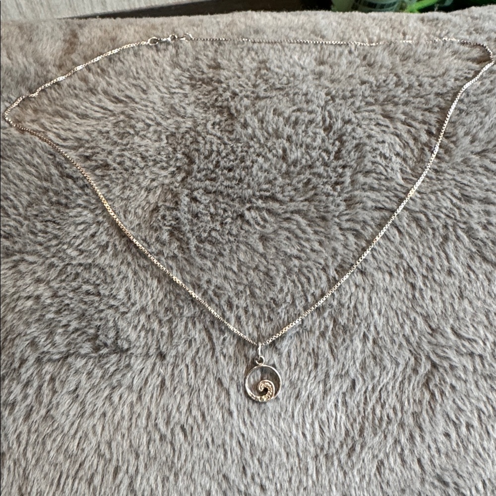 Elegant Sterling Silver sparkly wave pendant
